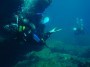 diving in Ibiza in a cave of crystal clear water