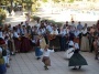 A folk dance act of kids on an Ibiza beach Cala san Vicente.