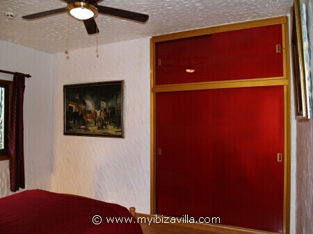 The built in wardrobes of the Romantic room of this Spain villa