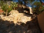 Ibiza Yoga stairs cut in the rock garden.