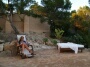 Leatitia reading a book at sunset hours on the yoga terrace.