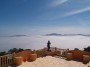 Low clouds above the cala San Vicente bay