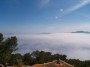 Spectaculair zicht van deze Ibiza villa juist boven de wolken (mist), foto April 2006