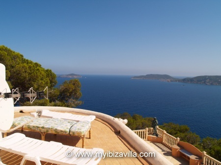 sunbathing on the roof of the villa in Ibiza.